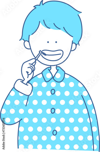 歯間ブラシをする男の子