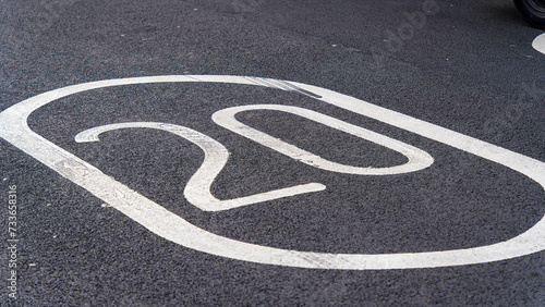 20mph speed sign painted on asphalt © WD Stockphotos
