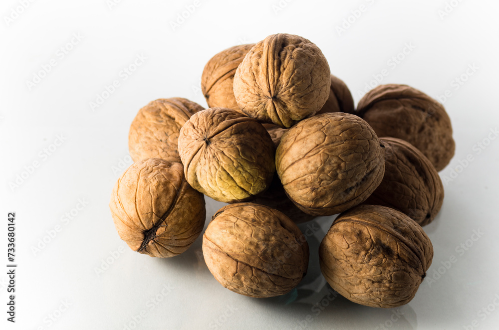 Group of walnuts on a white background, isolated Group of walnuts on a white background, isolated