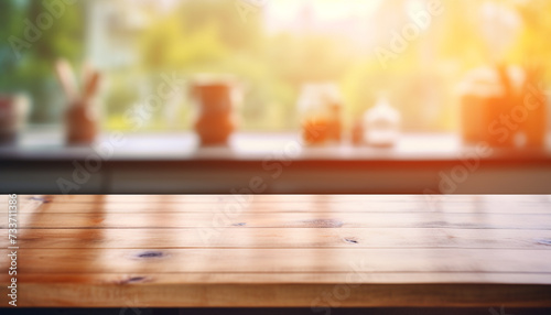 Wooden table on blurred kitchen background © Ovidiu