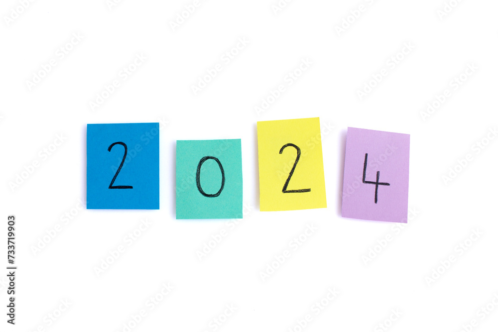 2024 written on four seperate colorful sticky notes - isolated on white background, image for the new year 2024 2024 written on four seperate colorful sticky notes - isolated on white background, image for the new year 2024