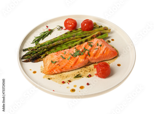 Tasty grilled salmon with tomatoes, asparagus and spices isolated on white