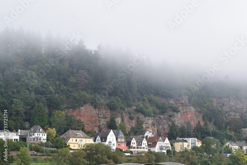 the red cliffs at the Mosel in Trier with fog photo