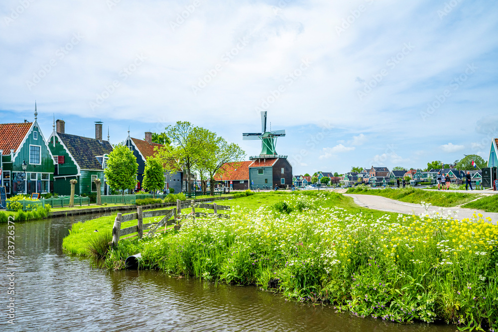 Zaanse Schans village with houses and windmills in summer, Holland