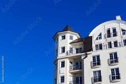 Low angle architectural detail view eclectic baroque style building.