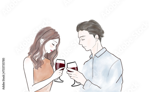 ワイングラスを傾けて乾杯するカップル