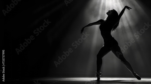 Grace in the Dark, A Woman Dance against the Black Canvas