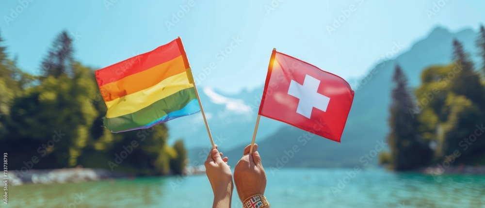 hands showing LGBTQ Rainbow and  flag on nature background. Support Lesbian, Gay, Bisexual, Transgender and Queer community and Pride month concept