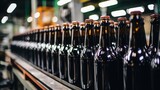 Empty dark bottles without labels on the production line