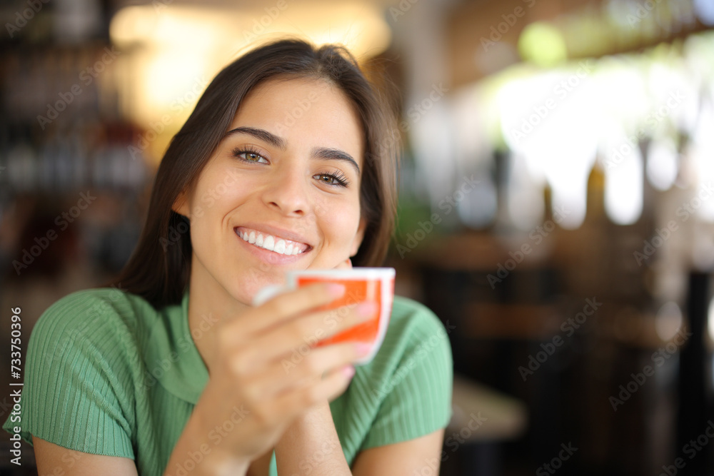 Happy woman with perfect smile drinking coffee Happy woman with perfect smile drinking coffee