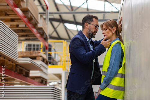 Wallpaper Mural Female worker in manufactury feeling vulnerable and intimidated by superior manager, forced touching at workplace. Sexual harassment at work. Torontodigital.ca