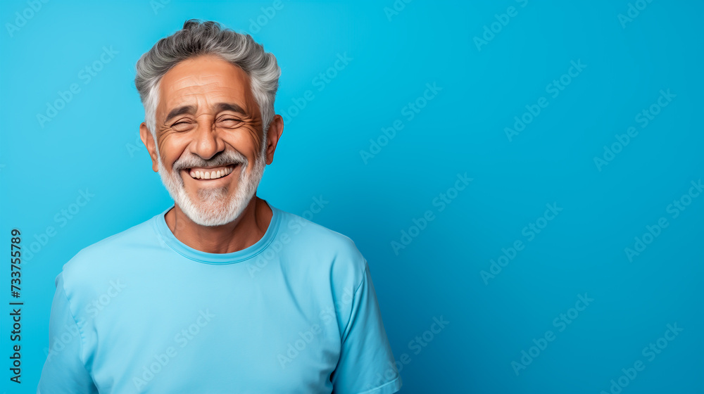 Portrait of happy man isolated on blue background, copy space Portrait of happy man isolated on blue background, copy space