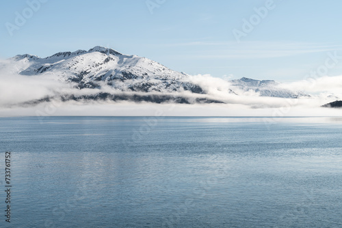Sea fog on the mountains and sea in Passage Canal, Whittier, Alaska USA