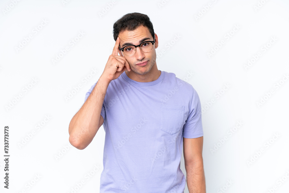 Young caucasian man isolated on white background thinking an idea Young caucasian man isolated on white background thinking an idea