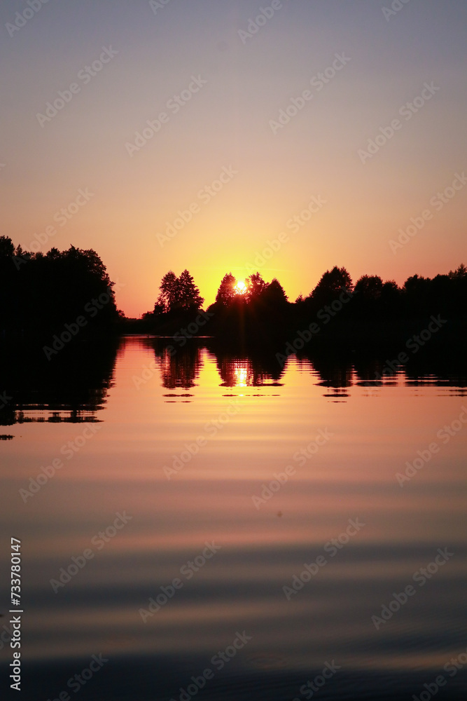sunset over the lake sunset over the lake