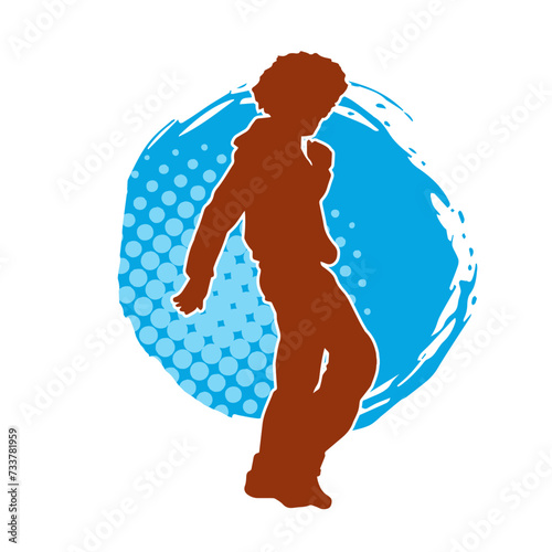 Silhouette of a male dancer in performing pose. Silhouette of a dancing man.