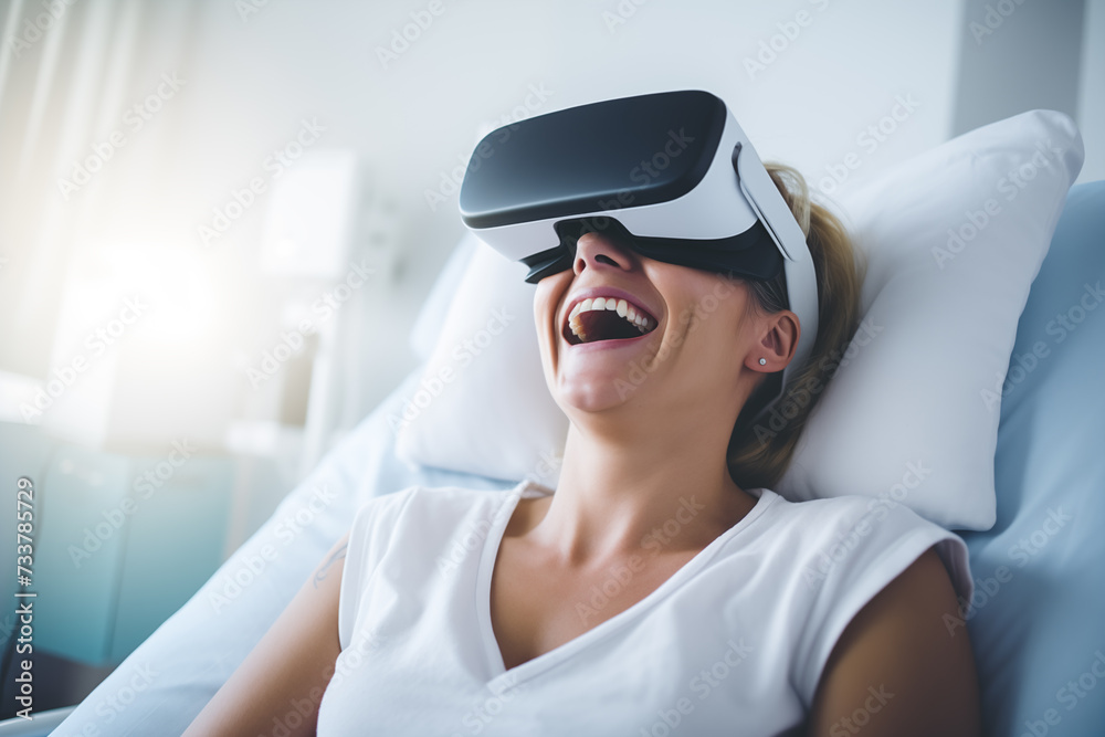 A bedridden patient in hospital having fun while wearing virtual reality glasses A bedridden patient in hospital having fun while wearing virtual reality glasses