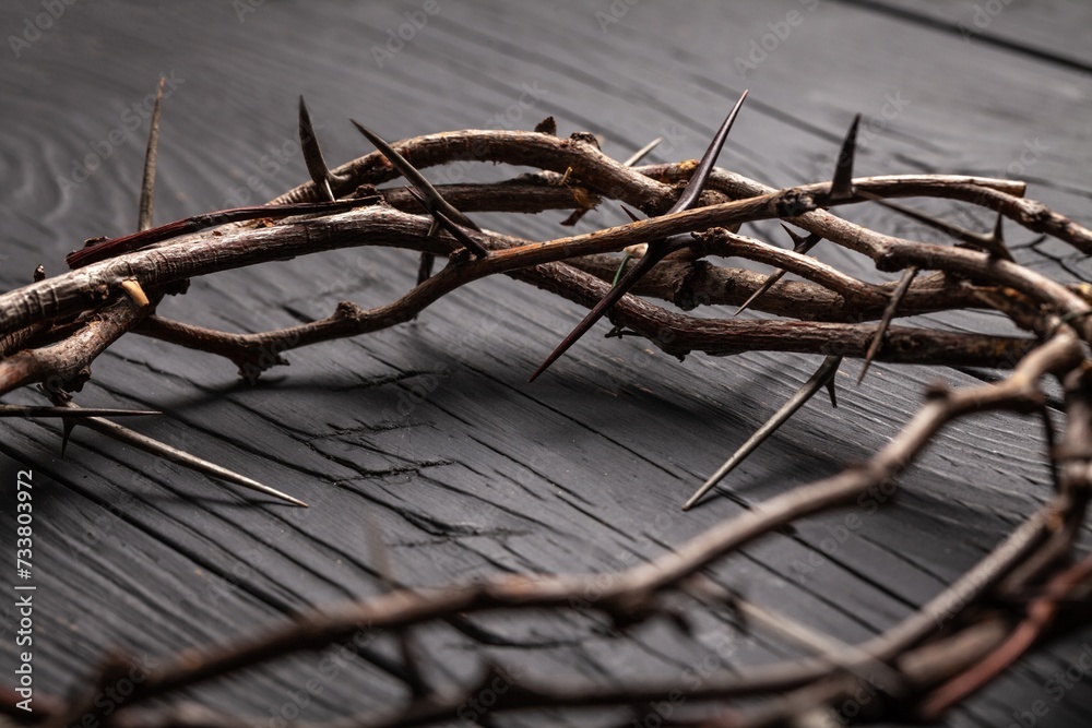 Christian crown of thorns on dark desk background Christian crown of thorns on dark desk background