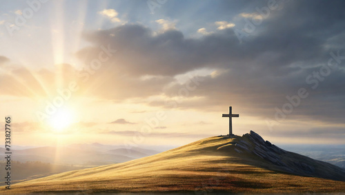 Silhouette of crucifix on hill