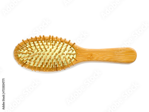 Wooden hairbrush with bamboo pins