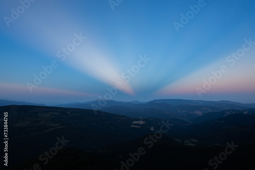 Sunset with anticrepuscular rays in the Sierra del Cadi  Pyrenees  Spain