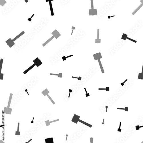 Seamless vector pattern with mallet symbols, creating a creative monochrome background with rotated elements. Vector illustration on white background