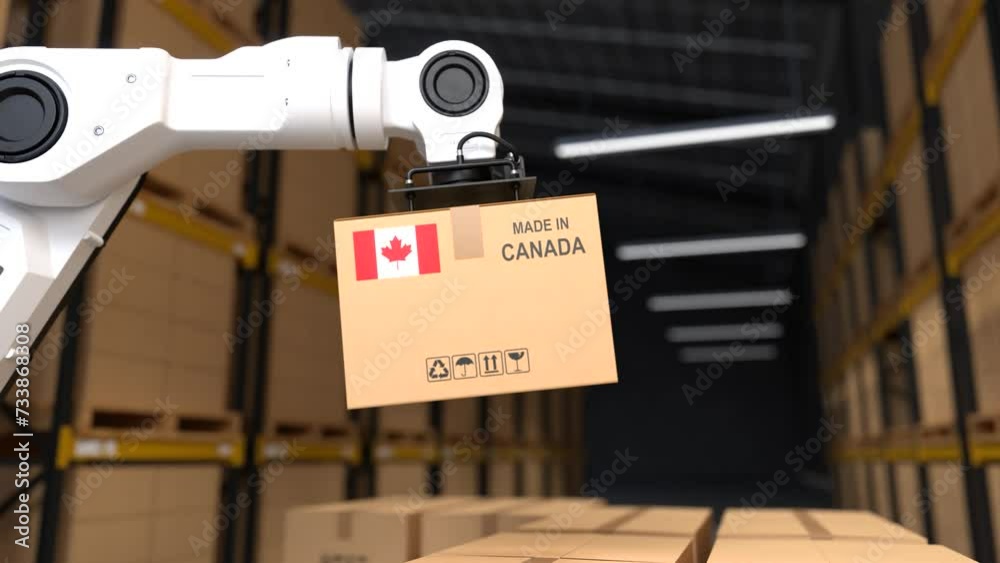 The robot arm is lifting a box of products made in Canada, The Warehouse automation concept