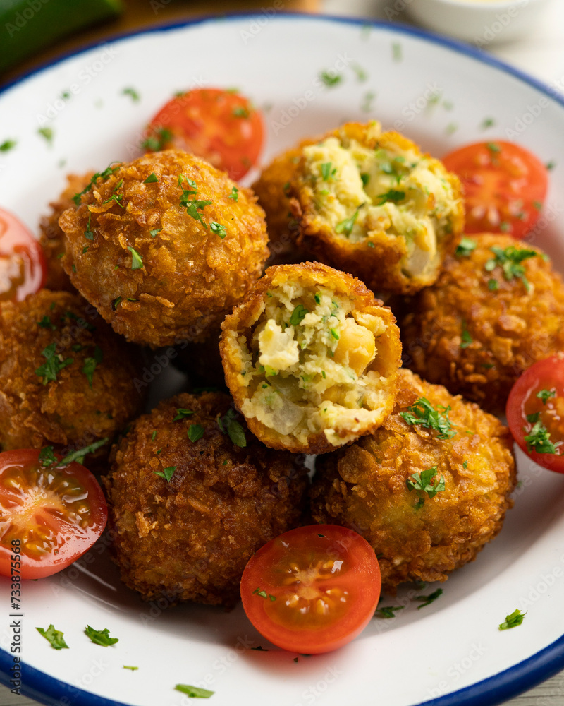 Spanish vegan chickpea croquettes with eggplant and zucchini.