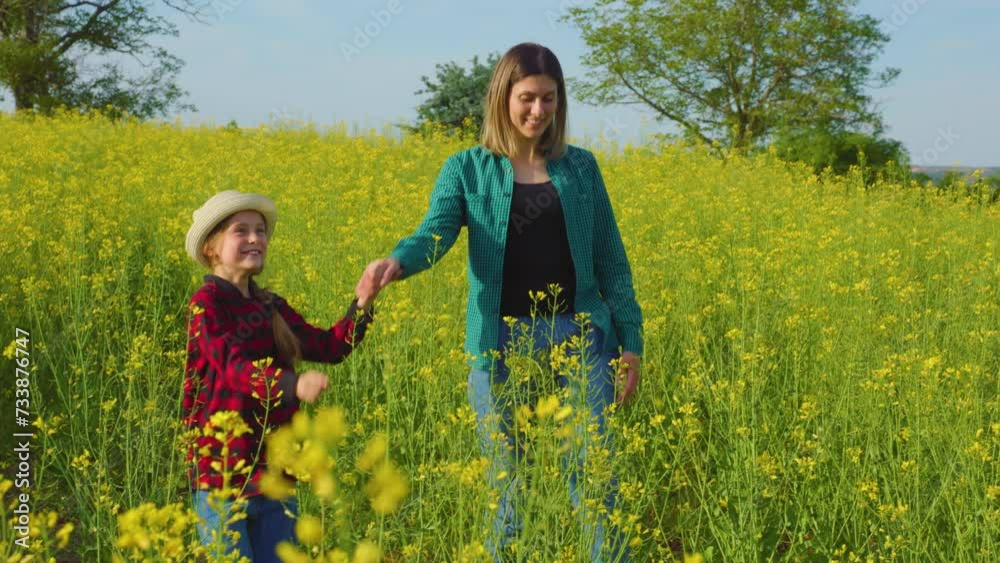 farmer family walk together mother and daughter holding hands