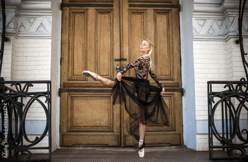 European Ballerina girl in city scene. Concept of ballet and dance European Ballerina girl in city scene. Concept of ballet and dance