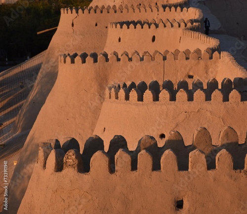 Walls of Itchan-Kalas fortress in sunset light at Khiva, Uzbekistan © Thomas