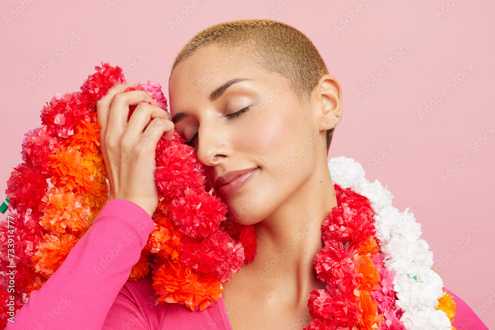 Young blond woman with closed eyes wearing floral garland 