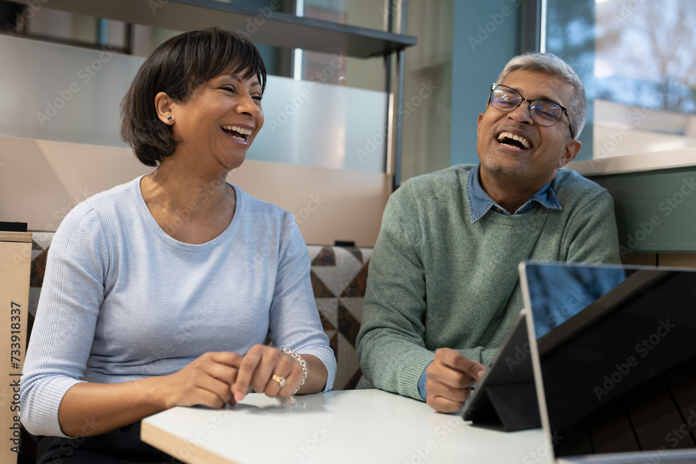 Smiling business people working in office Smiling business people working in office