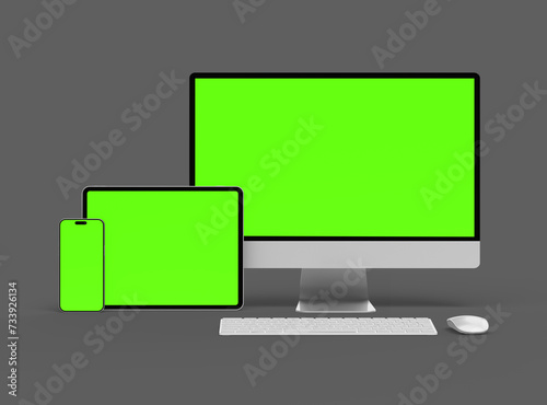 3D Render of smartphone tablet desktop with green screens on a dark background
