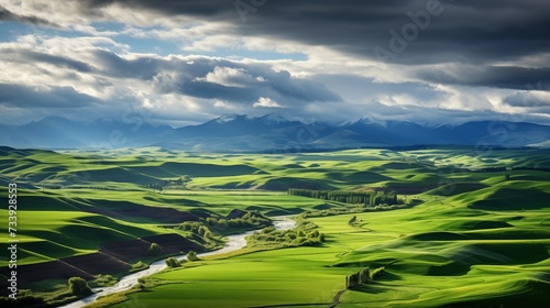 Farm landscape photograph. Sprawling farmland over flowing hills.