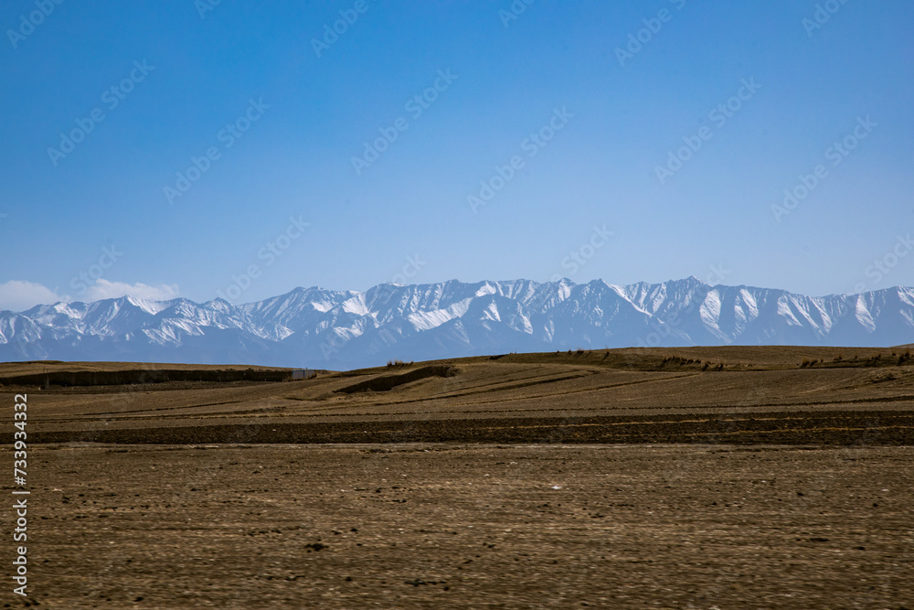 Shandan Military Horse Farm, Zhangye City, Gansu Province - Road under the snowy mountains of Qilian Mountains
