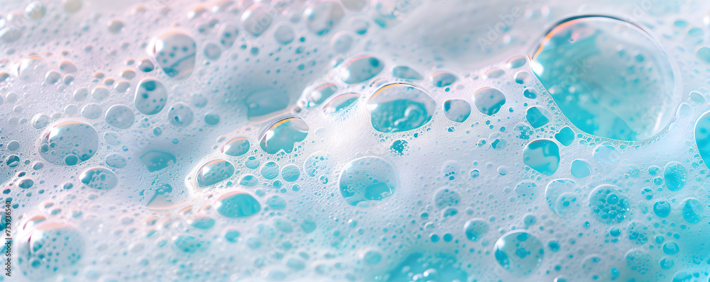 Macro photo of bubbles in water. Background with foam made of soap, shampoo, lotion, detergent in blue colour. Banner with copy space for laundry and cleaning services, spa, beauty, skin care concept. Macro photo of bubbles in water. Background with foam made of soap, shampoo, lotion, detergent in blue colour. Banner with copy space for laundry and cleaning services, spa, beauty, skin care concept.