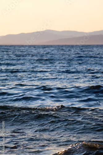 Bright blue sea and clear sky. Copy space.