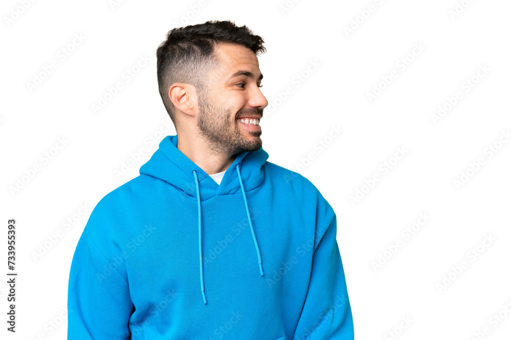 Young handsome caucasian man over isolated chroma key background looking to the side and smiling Young handsome caucasian man over isolated chroma key background looking to the side and smiling