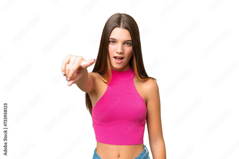 Teenager caucasian girl over isolated background frustrated and pointing to the front Teenager caucasian girl over isolated background frustrated and pointing to the front