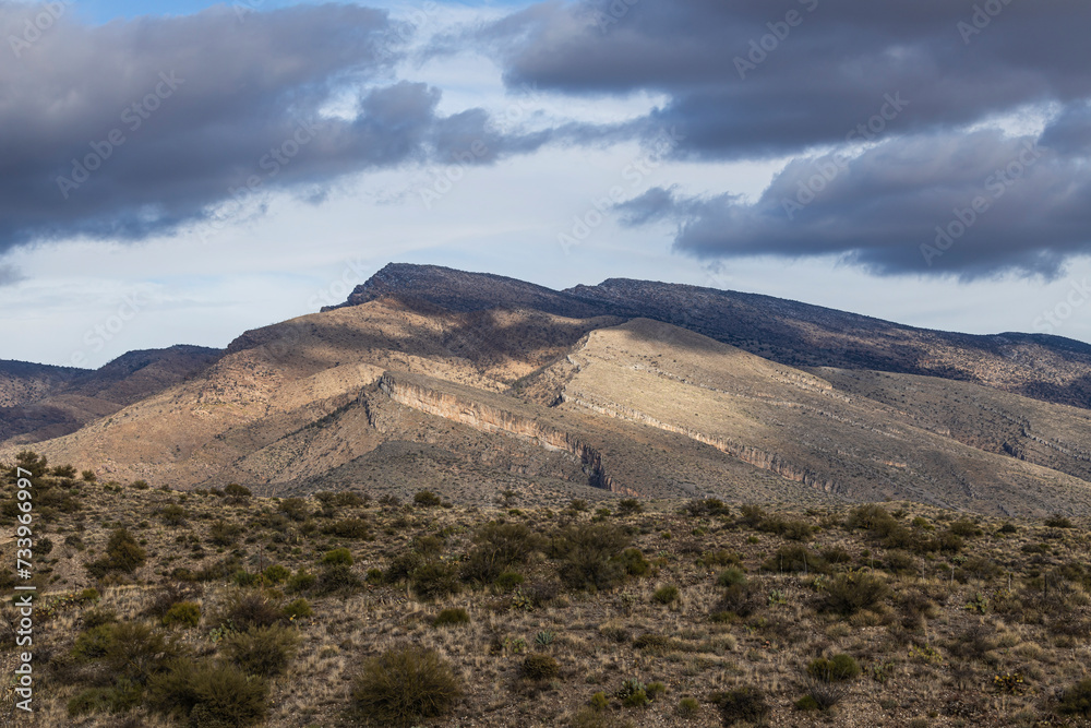 Distant mountains in desert of Arizona with a light dusting of snow.