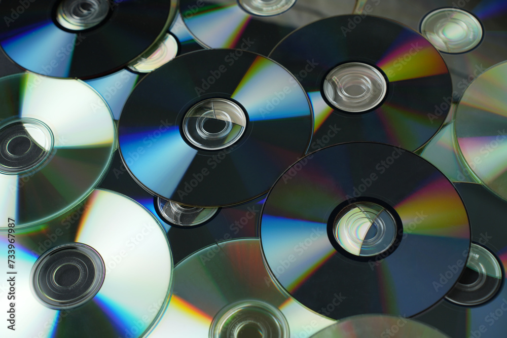 Stacked CD DVD background, close-up. Stacked CD DVD background, close-up.