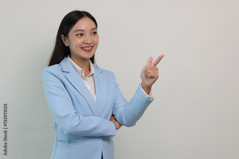 Cheerful beautiful Asian business woman smiling. Cheerful beautiful Asian business woman smiling.