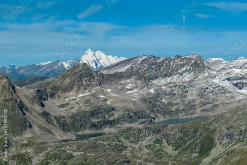 Panoramic view of majestic mountain peak Grossglockner in remote High Tauern seen from Feldseekopf, Carinthia Salzburg, Austria. Idyllic hiking trail in Goldberg group in wilderness of Austrian Alps