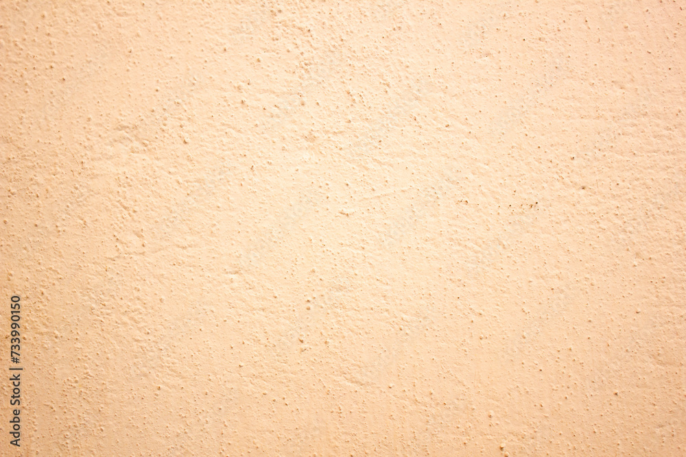 Rough wall texture, orange, beige wall surface. Authentic wall with copy space.