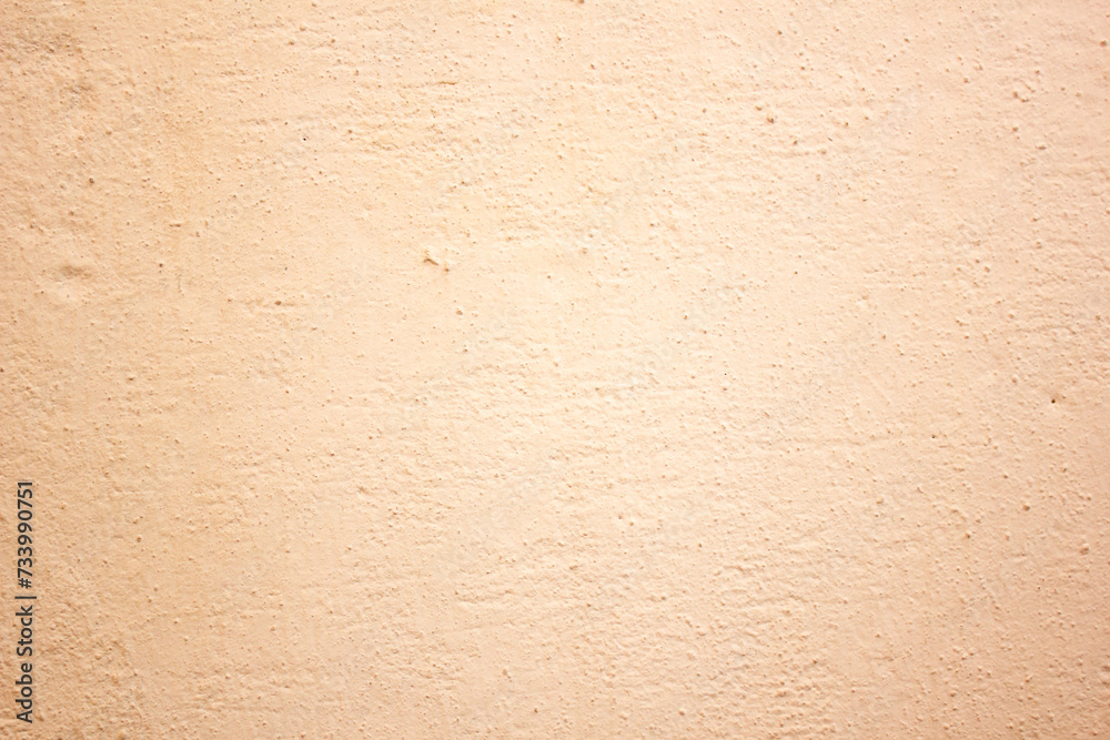 Rough wall texture, orange, beige wall surface. Authentic wall with copy space. Rough wall texture, orange, beige wall surface. Authentic wall with copy space.