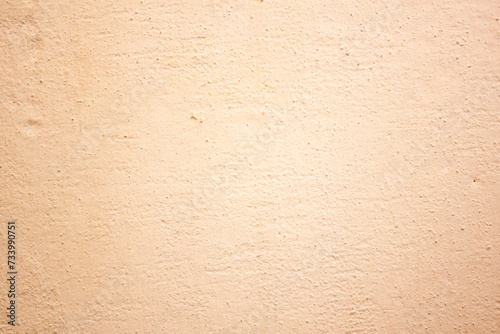 Rough wall texture, orange, beige wall surface. Authentic wall with copy space.