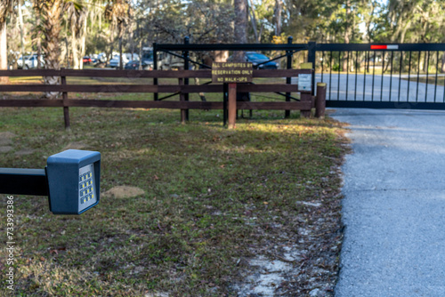 Wired numeric keypad opener for sliding vehicle entry gate, keyless entry, digital code, Tillis Hill Campground, Withlacoochee State Forest, Florida photo