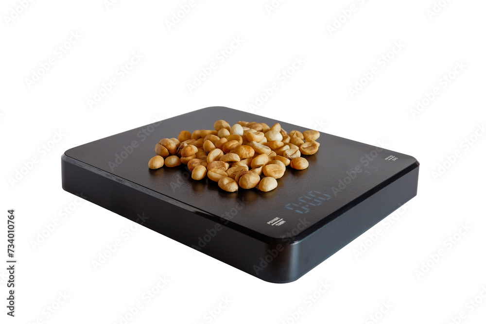 Black digital weighing scale for coffee beans measure. Black digital weighing scale for coffee beans measure.