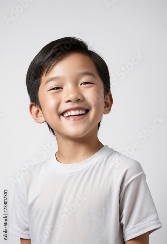 Happy Smiling Asian Boy on White Background